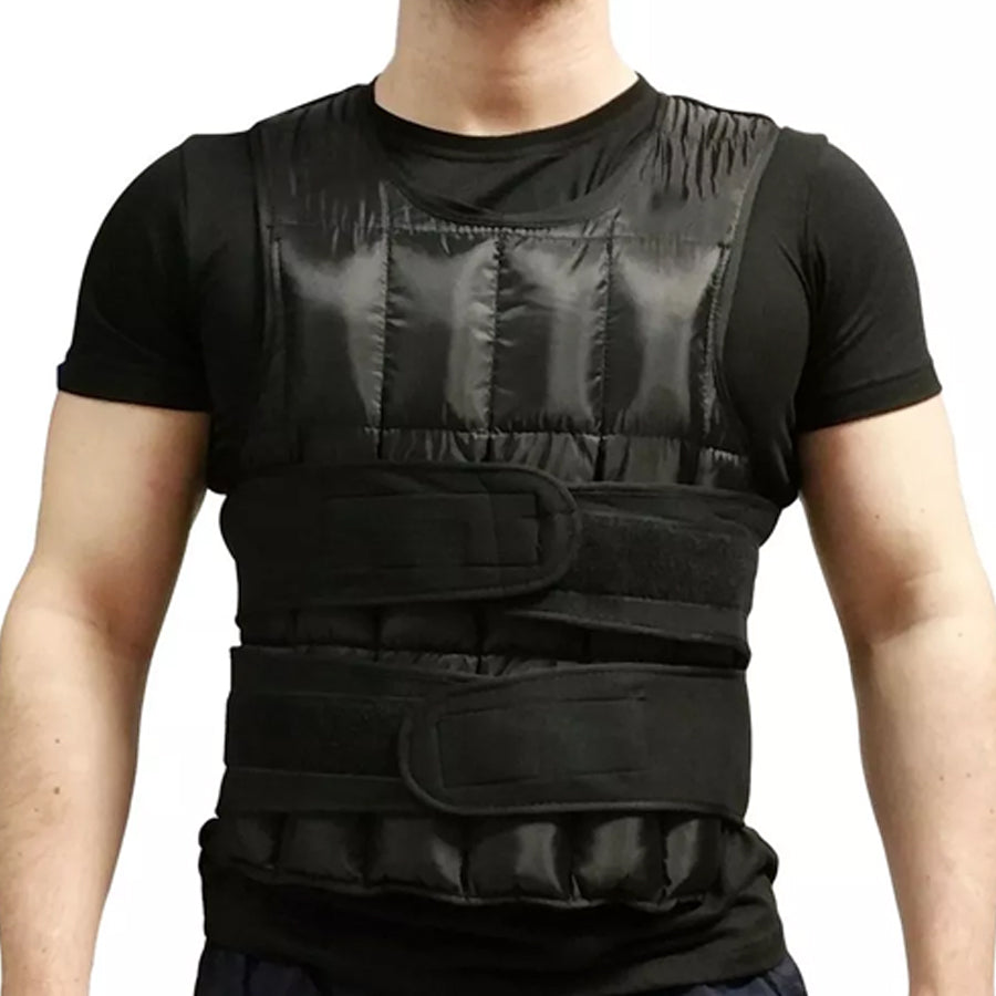 Person wearing a black weighted vest over a black t-shirt.