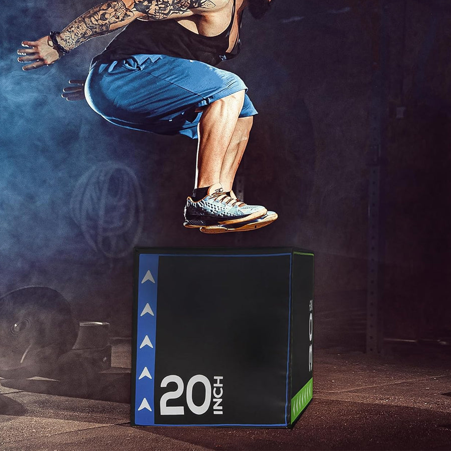 Person jumping over a 20-inch box in a gym setting.