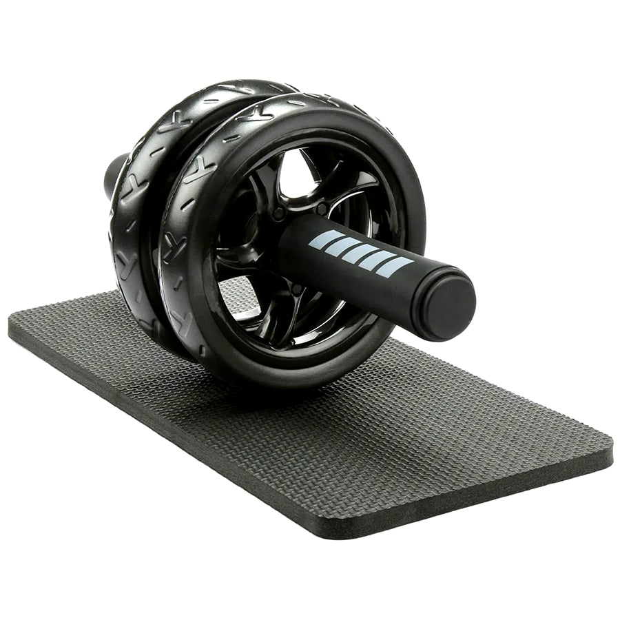 Black ab roller on a black mat on a white background
