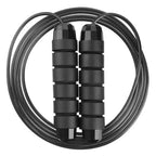 Black jump rope with metal clasps on a white background