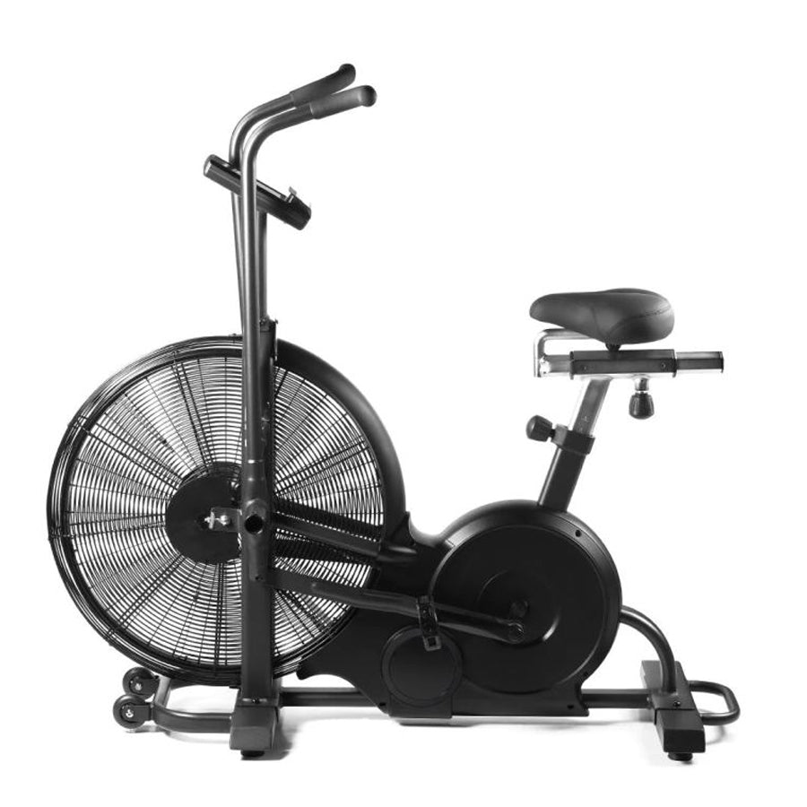 A black magnetic belt-driven exercise bike with a large fan wheel, adjustable seat, and a tablet mount.