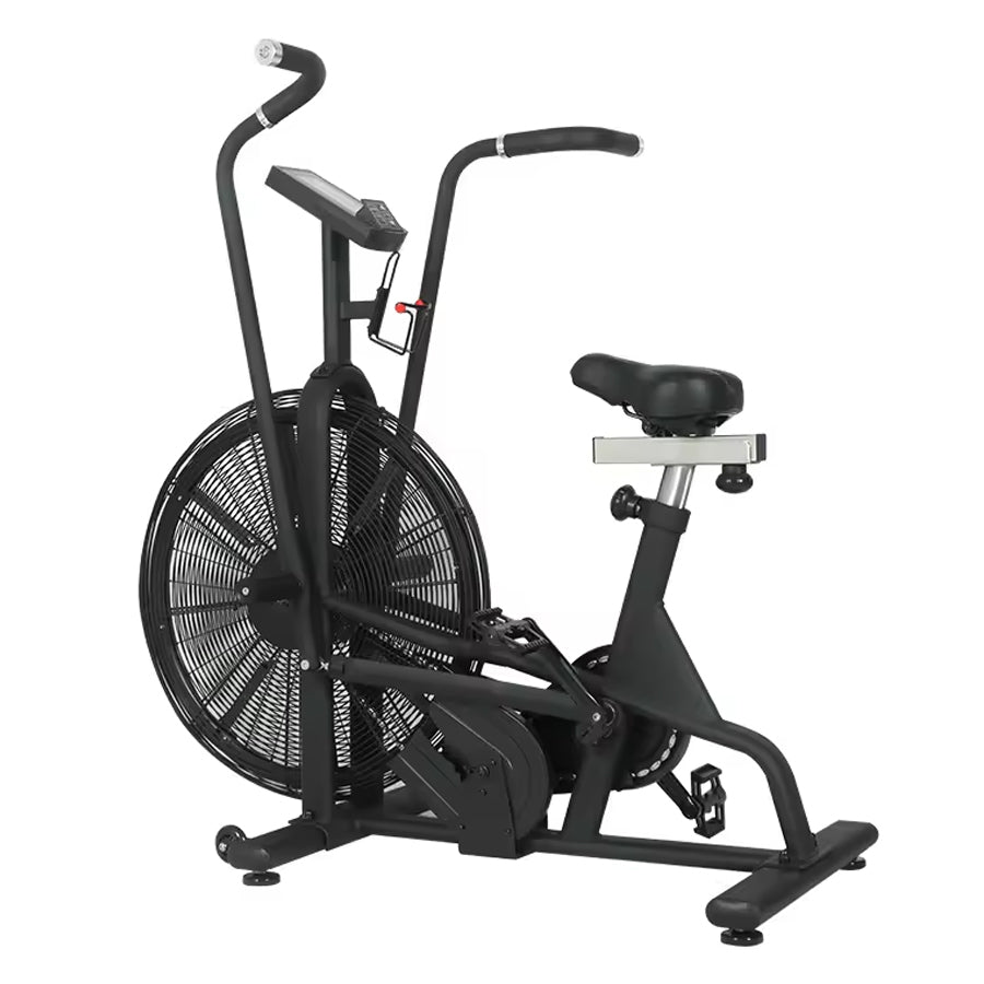 Black air bike exercise machine on a white background