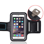 Phone armband with key holder feature on a white background.
