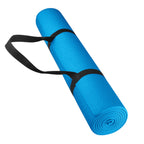 A rolled up purple yoga mat with a black carrying strap.