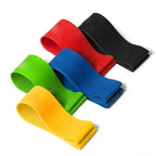 Set of colorful resistance bands on a white background