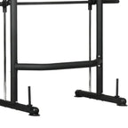 Black metal pull-up bar and weight rack on a white background