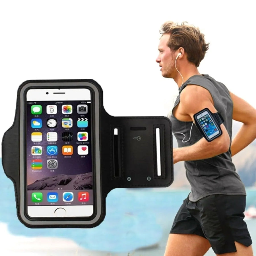 Man running with phone armband and smartphone