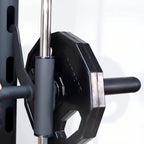 Close-up of a gym barbell with weight plates on a white background