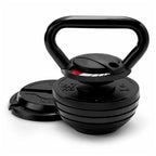 Black cast iron kettlebell with weight markings on a white background