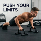 A shirtless man in a push-up position on black underbarrel push-up stands in a gym with the text 'PUSH YOUR LIMITS' on a white background.
