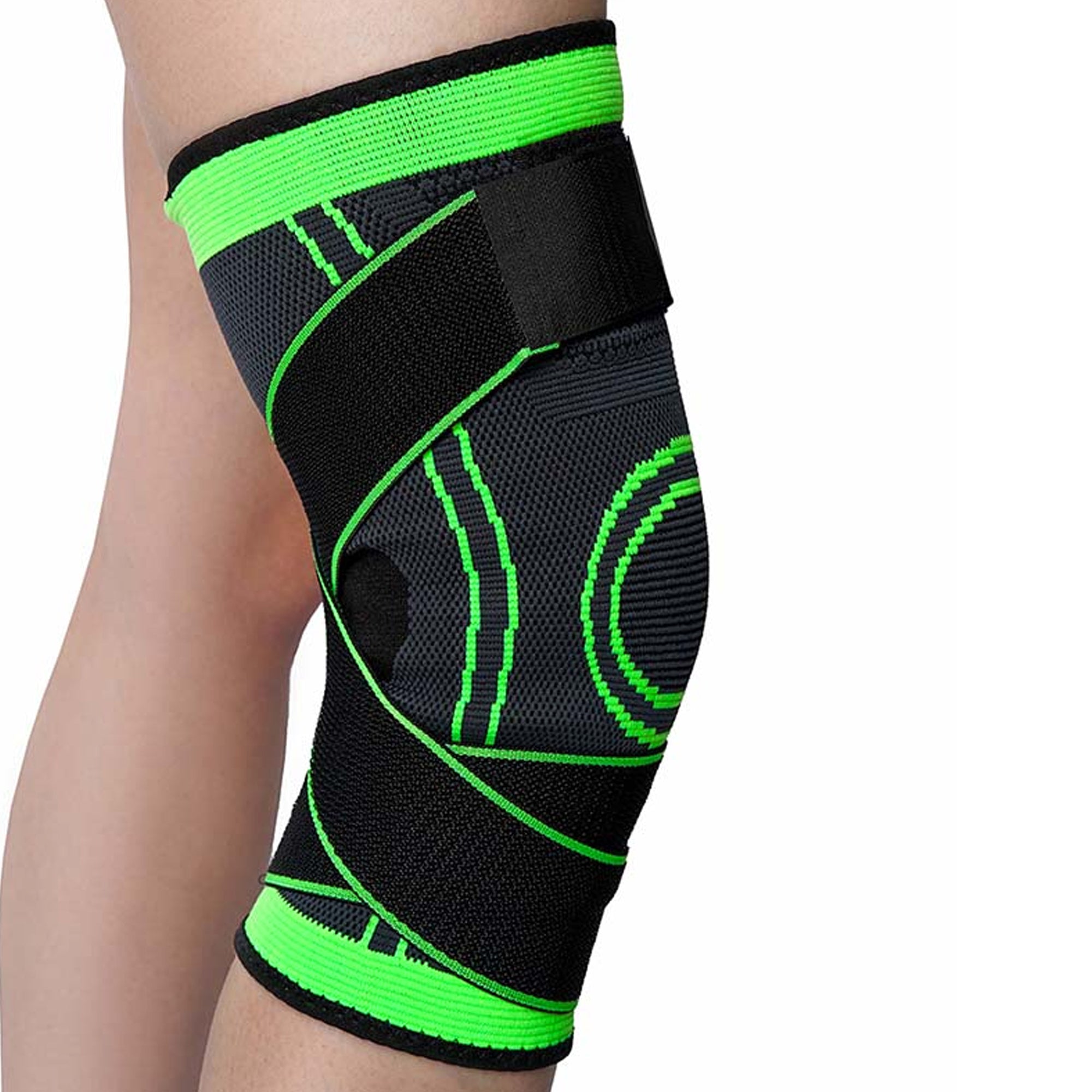 Black and green knee brace on a person's knee against a white background