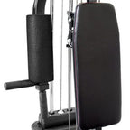 Black gym machine with arm pad and shoulder pad on a white background
