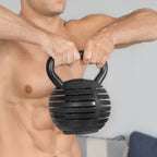 Man holding a black textured kettlebell against a plain background