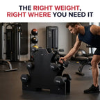A man in a gym reaches for a black weight rack holding dumbbells, with the text 'THE RIGHT WEIGHT, RIGHT WHERE YOU NEED IT' at the top.