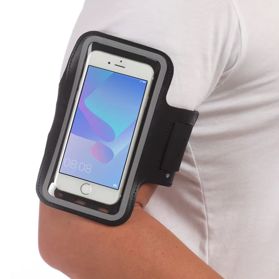 Person wearing a black arm band with a smartphone on their arm.