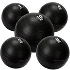 5 black heavy duty slam balls with a textured surface and the white background