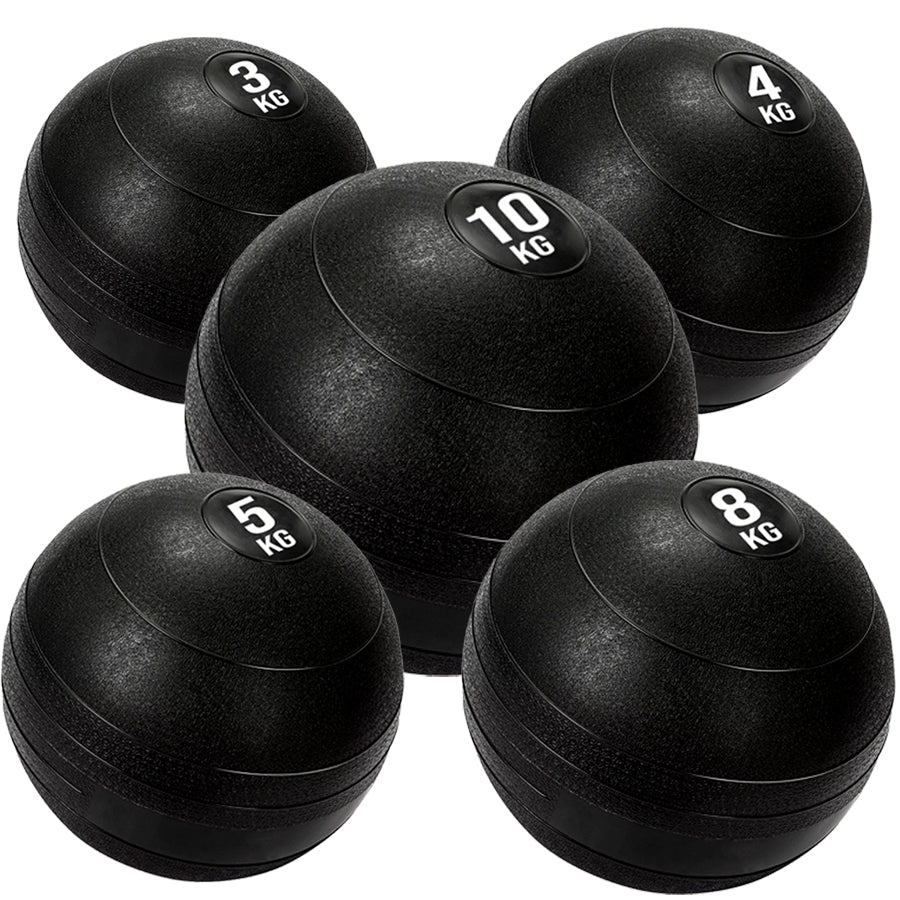 5 black heavy duty slam balls with a textured surface and the white background