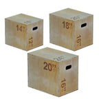 A beige 3-in-1 wooden plyometric jump box with marked heights for box jumps and step-ups.