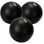 3 black heavy duty slam balls with a textured surface and the white background