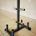Black metal weightlifting stand on a tiled floor