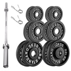 Set of weight plates, barbell, and connectors on a white background