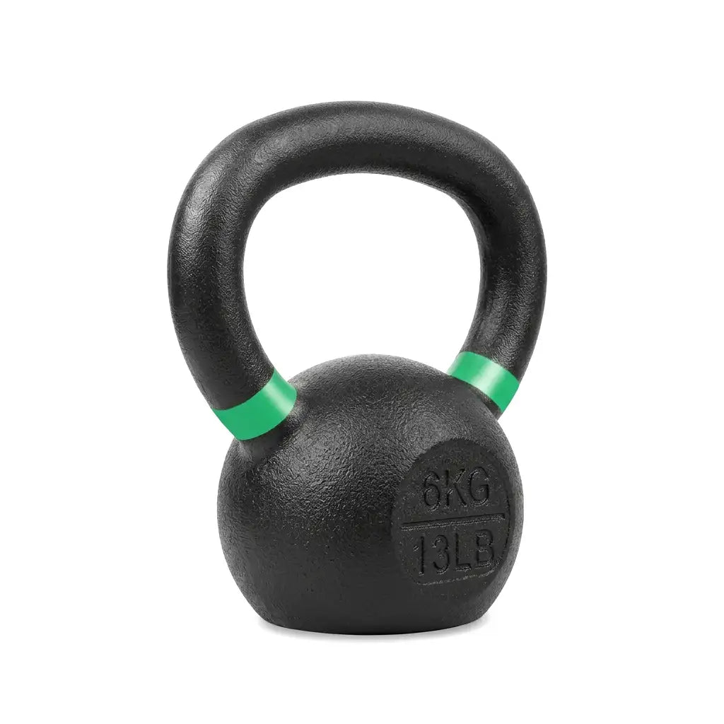 A black cast iron kettlebell with a textured finish, featuring bright green bands on the handle and a stamped '6KG 13LB' logo on the base, isolated on a white background.