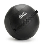 A black 6kg medicine ball with white printed text and black diamond-stitched seams, shown on a clean white background.