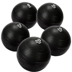 5 black heavy duty slam balls with a textured surface and the white background