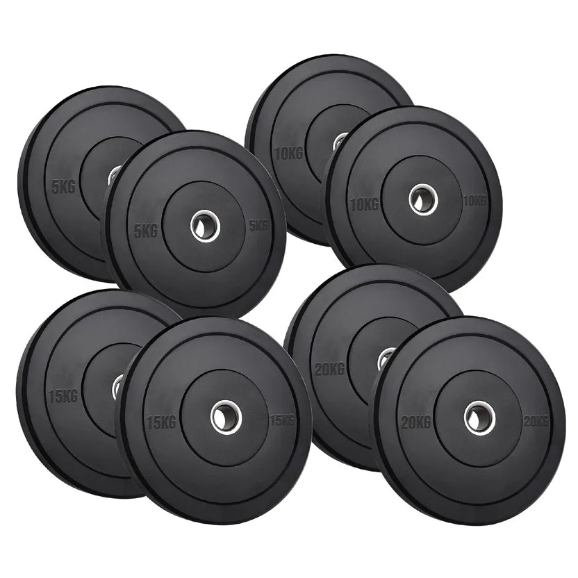 Set of black bumper weight plates with varying weights on a white background