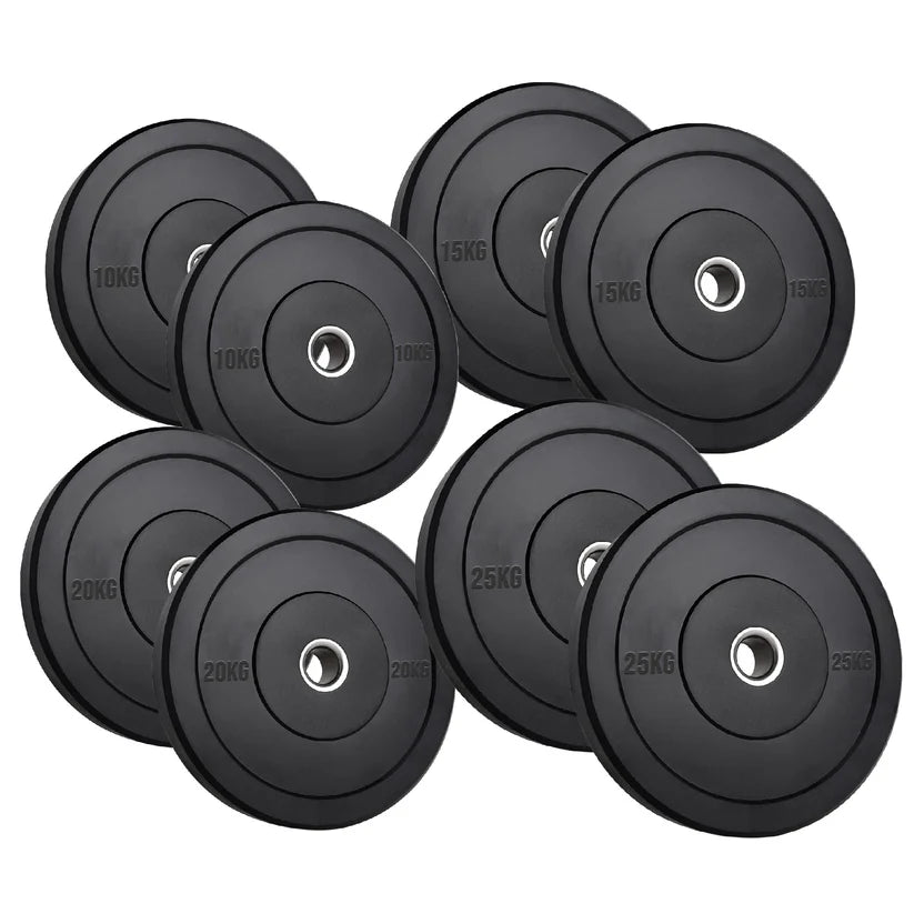 Set of black weight plates with varying weights on a white background