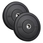 Two black weight plates with '20KG' marking on a white background