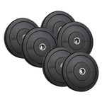 Set of black weight plates with weight markings on a white background