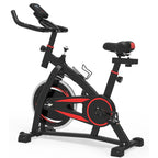 A black and red indoor cycling bike with an LCD display, professional-grade resistance levels, adjustable seat and handlebars, and a tablet holder.