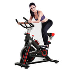 Woman exercising on a stationary bike