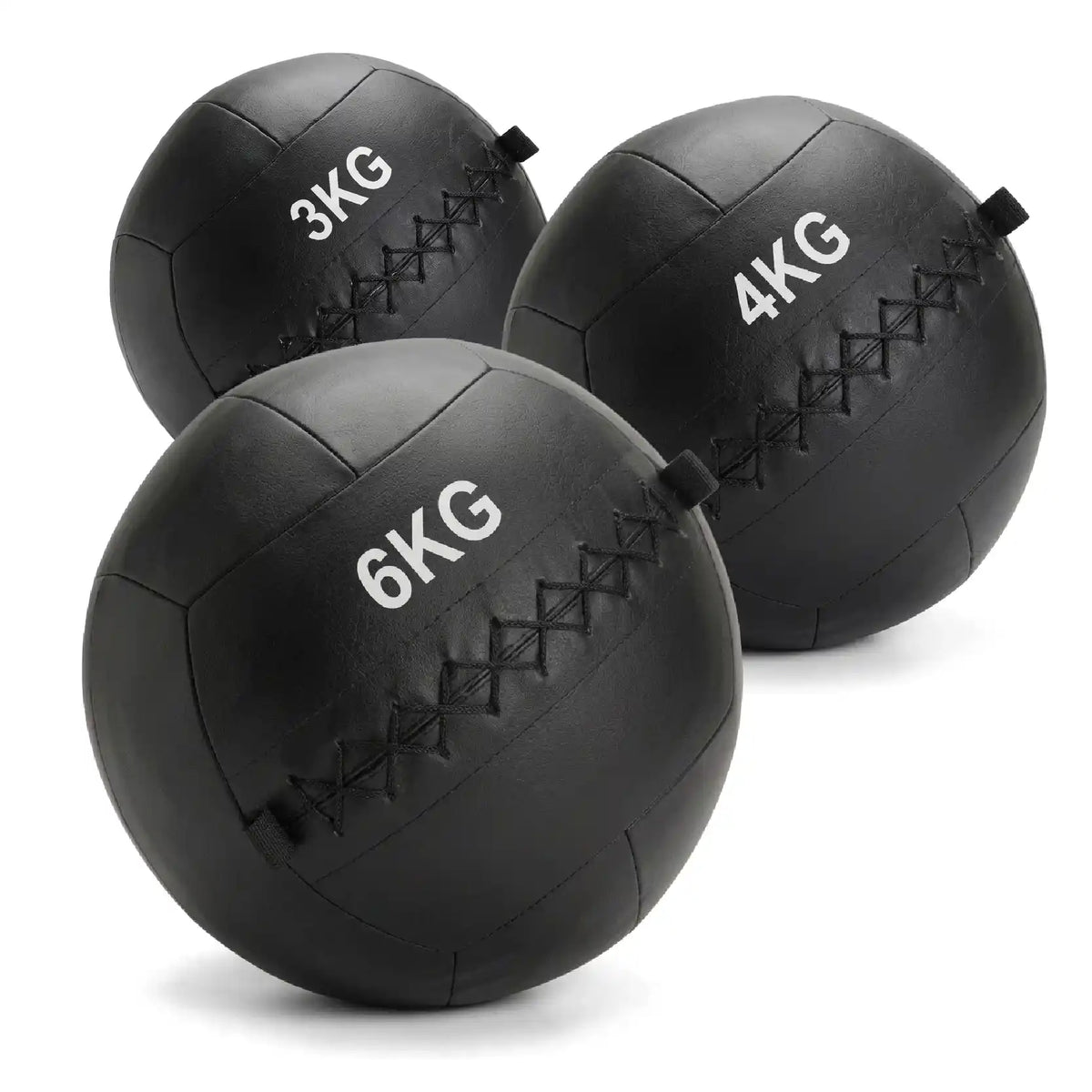 Three black medicine balls for weight training, labeled 3KG, 4KG, and 6KG, arranged on a clean white background.