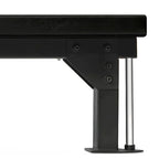 Black metal bench with a white background