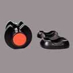 Black and red object on a gray background