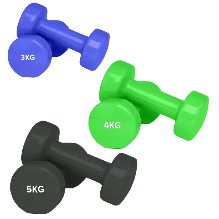 Set of colorful dumbbells with weight markings on a white background
