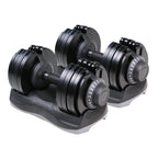 Pair of adjustable dumbbells on a white background