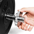 Hand using a metal tool on a wheel, likely for maintenance or repair.