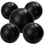 Set of black weighted exercise balls with varying weights on a white background