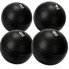 Four black exercise balls with weight markings on a white background
