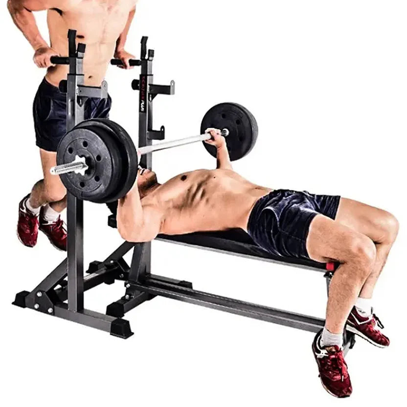 Person using a weight bench with weights on a white background