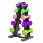 Dumbbell set with weights on a stand against a white background