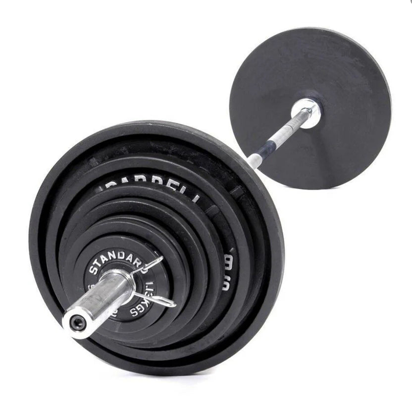 Set of weight plates with a barbell on a white background