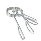 Metal spring clips on a white background