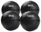 A black, double-stitched, textured wall ball with the weight '3KG,6KG,9KG,12KG' printed on it.