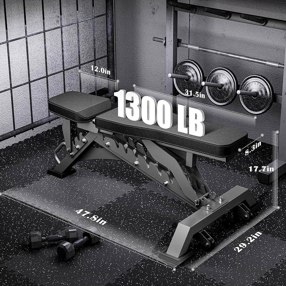 Gym weight bench with weight plates and measurements on a black mat.