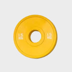 Yellow weight plate with '1.5 KG' marking on a light gray background